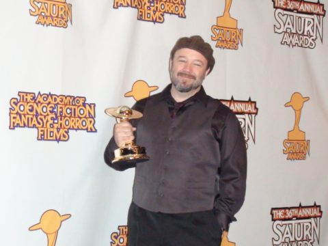 Barney Burman with his 2010 Saturn for Best Make-up for "Star Trek"
