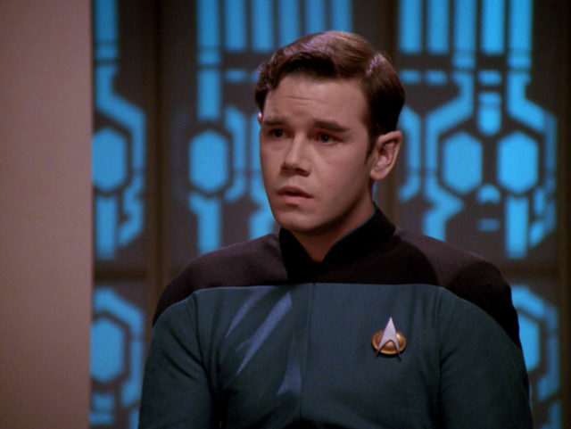 Spencer Garrett as Simon Tarses in Star Trek: The Next Generation