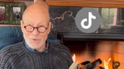 Patrick Stewart on TikTok in front of a roaring fire reading Charles Dickens
