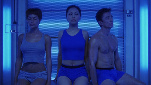 T'Pol, Sato, and Reed in the decontamination chamber on Star Trek: Enterprise