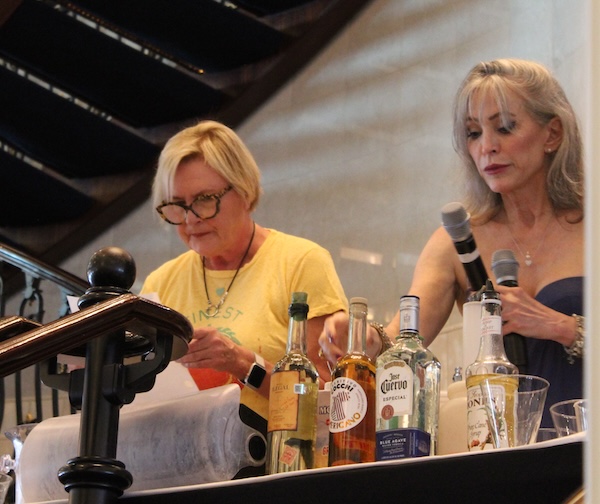 Nana Visitor and Denise Crosby prepare drinks